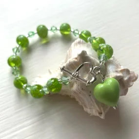 Bracelet with green Murano glass marguerite beads, Swarovski© crystals and heart charm